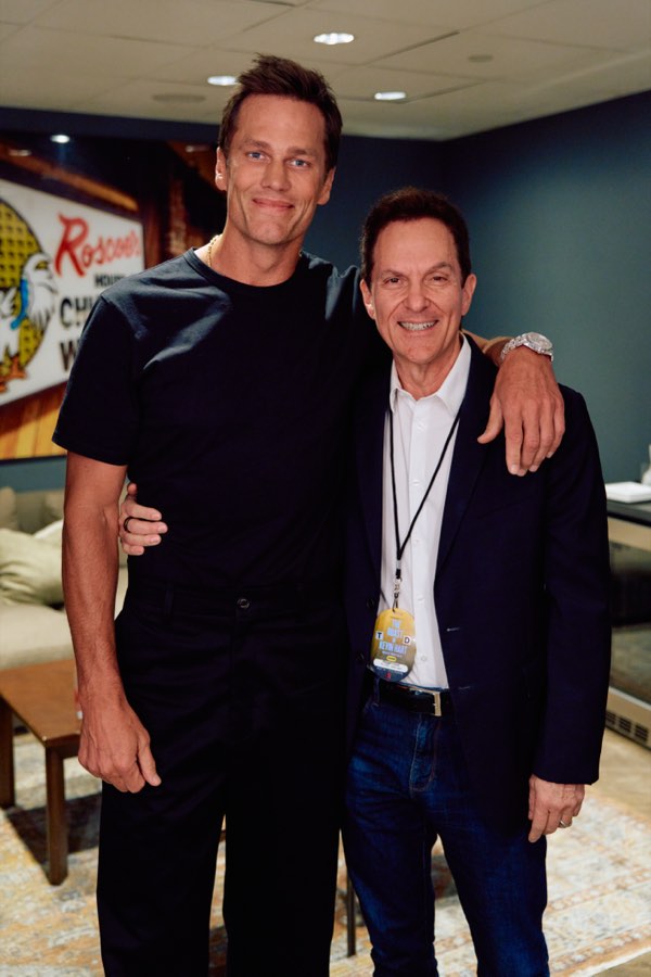 Roger Love with NFL legend Tom Brady.