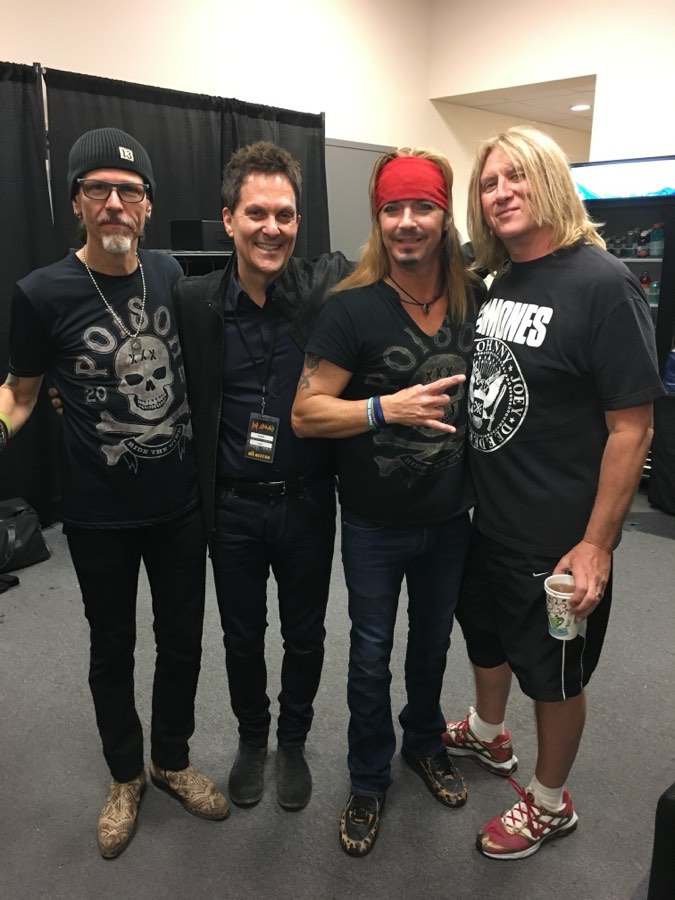 Roger Love with the band Poison.